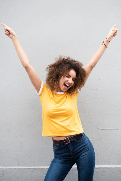 Portrait Happy Young Woman Arms Raised Pointing Fingers — Stock Photo, Image