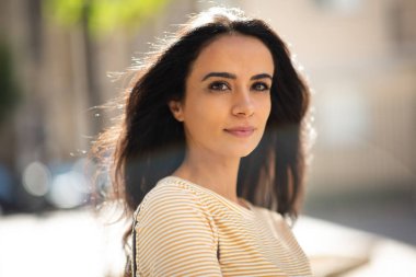 Close up portrait of beautiful young north african woman outdoor