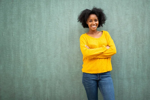 Portrait Young African American Woman Smiling Arms Crossed Green Background — Stock Photo, Image