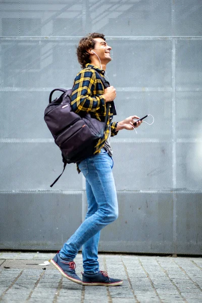 Full Body Side Portrait Travel Man Walking Cellphone Earphones — Stock Photo, Image