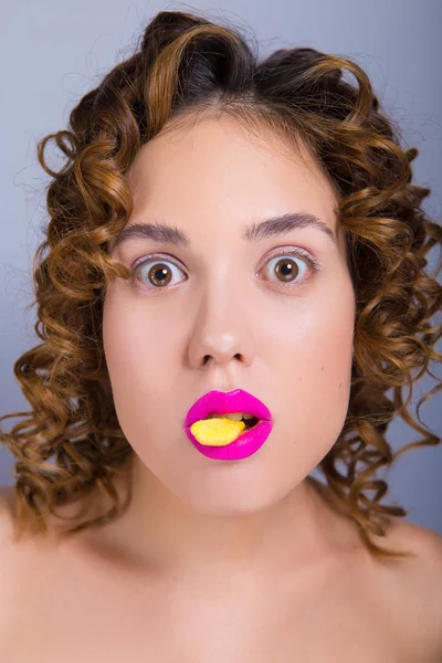 Beautiful Girl Colored Lipstick Lips Mouth Girl Yellow Candy Girl Royalty Free Stock Images