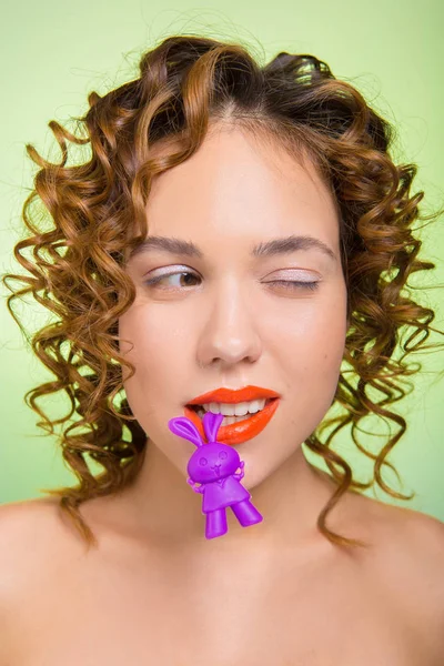 Young Girl Girl Has Orange Lipstick Girl Has Toy Her Stock Photo