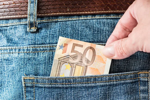 Steal money pocket pants — Stock Photo, Image