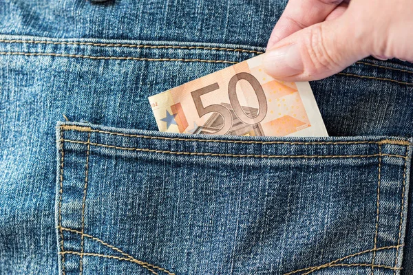 Steal money pocket pants — Stock Photo, Image