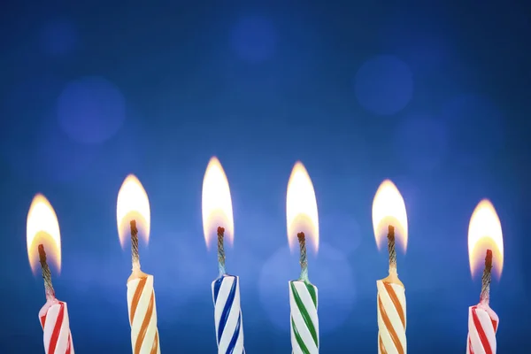 Colorful Funny Birthday Candles Lit Blue Background Birthday Party Anniversary — Stock Photo, Image