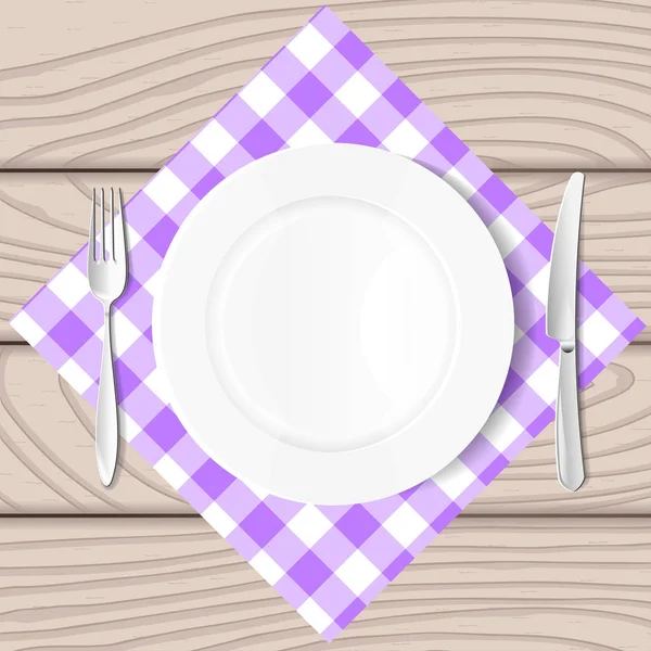 plaka üzerinde bir çatal ve bıçak, ahşap kurullarının bir arka plan üzerinde masa örtüsü