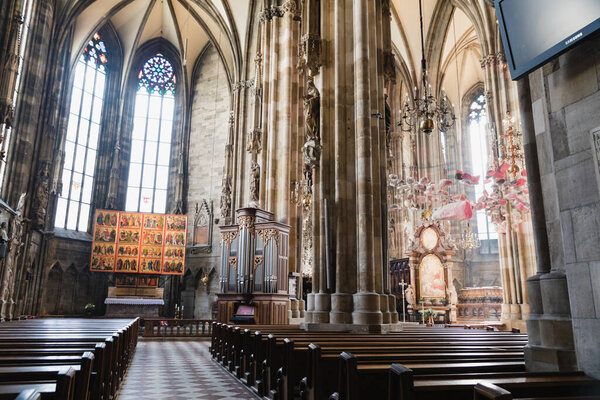 Vienna, Austria - March 23, 2019: Majestic interior of St. Stephen's Cathedral in Vienna, Austria, holy catolic church architecture