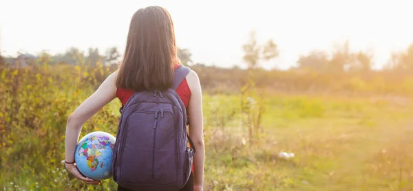 Girl Backback Holding Globe Sunset Light Background — Stock Photo, Image