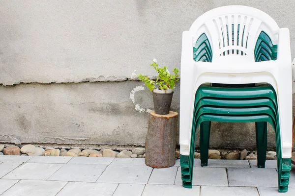 Stack Plastic Chairs Old Textured Wall Garden Countryside — Stock Photo, Image