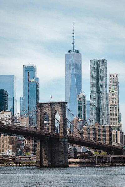 Brooklyn bridge and Manhattan cityscape, view on New York downtown from Dumbo, Brooklyn, USA