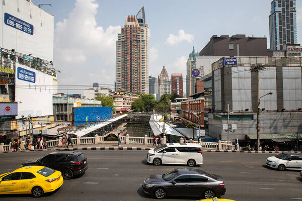 Bangkok, Thailand - February, 2020: View on busy road and Pratu Nam ferry terminal near Big C supermarket and Makkasan district