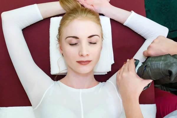 Anti-cellulite LPG body massage in the beauty salon.