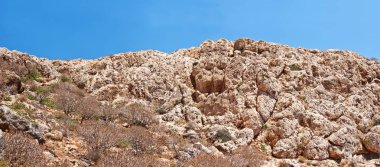 Panoramic-shot-of-rocks-of-Gravoussa-island-on-north-western-Crete-Greece