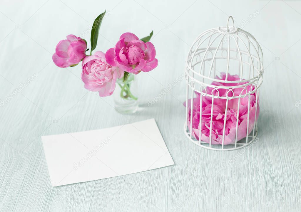 Small bird cage with peony flower bouquet, invitation card template with text space, Modern scandy style interior