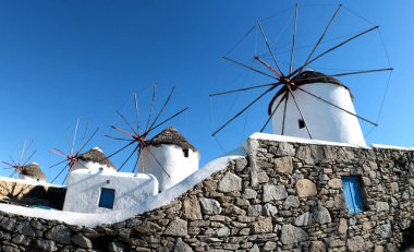 Scenic view of traditional greek windmills on Mykonos island, Cyclades, Greece clipart