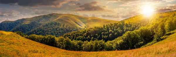 Hillside panorama in mountains at sunset — Stock Photo, Image