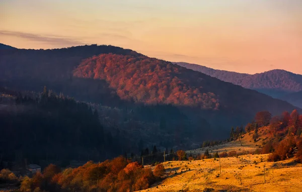 Warm sunrise in mountainous countryside — Stock Photo, Image