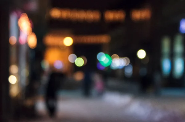 Oskarp bakgrund av stadens ljus på gatan — Stockfoto