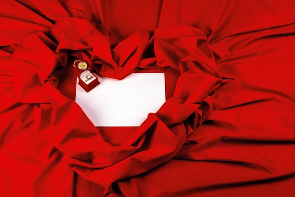 Valentine card composition on a red fabric — Stock Photo, Image