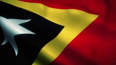 Doğu Timor bayrağı rüzgarda dalgalanıyor. Doğu Timor 'un bayrağı. Doğu Timor 'un kusursuz döngü animasyonunun işareti. 4k