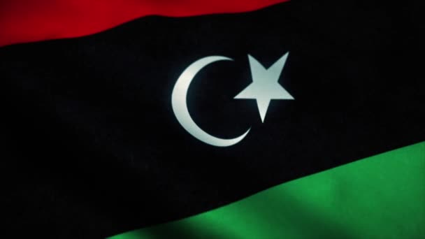 Libyens flagga viftar i vinden. Libyens nationella flagga. Tecken på Libyen sömlös loop animation. 4k — Stockvideo