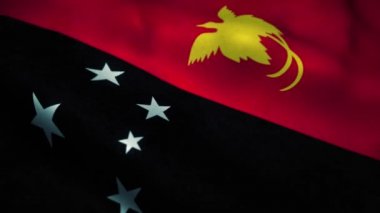Papua Yeni Gine bayrağı rüzgarda dalgalanıyor. Papua Yeni Gine 'nin ulusal bayrağı. Papua Yeni Gine 'nin kusursuz döngü animasyonunun işareti. 4k