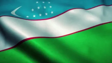 Özbekistan bayrağı rüzgarda dalgalanıyor. Özbekistan bayrağı. Özbekistan 'ın kusursuz döngü animasyonunun işareti. 4K