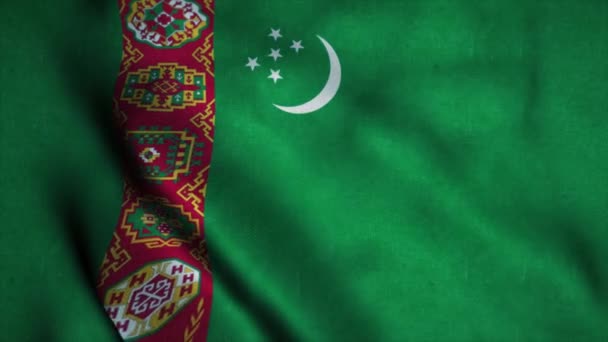 Turkmenistan flag waving in the wind. National flag of Turkmenistan. Sign of Turkmenistan seamless loop animation. 4K — Stock Video