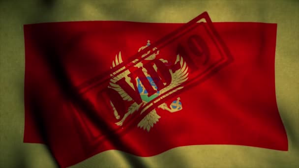 Covid-19-Marke auf der montenegrinischen Nationalflagge. Coronavirus-Konzept — Stockvideo