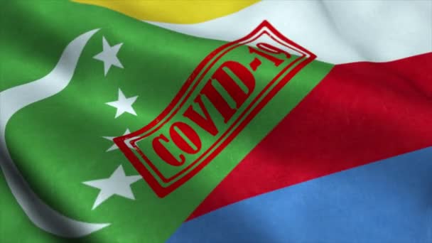 Covid-19 stamp on the flag of Comoros. Coronavirus concept — Stock Video