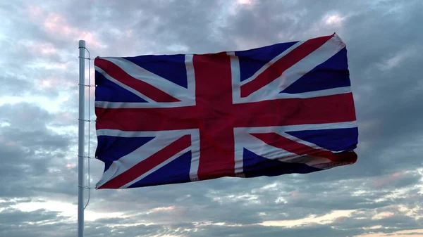 Realistyczna flaga Wielkiej Brytanii machająca na wietrze przeciwko głębokiemu dramatycznemu Niebu. Ilustracja 3D — Zdjęcie stockowe