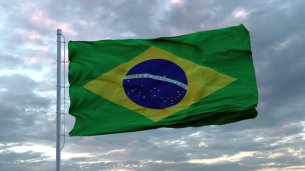Realistyczna flaga Brazylii machająca na wietrze przeciwko głębokiemu Dramatycznemu Niebu. 4K UHD 60 FPS Powolny ruch — Wideo stockowe