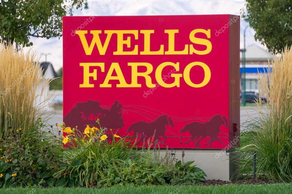 PROVO, UT/USA - OCTOBER 2, 2016: Wells Fargo exterior sign and logo. Wells Fargo & Company is an American international banking and financial services holding company.