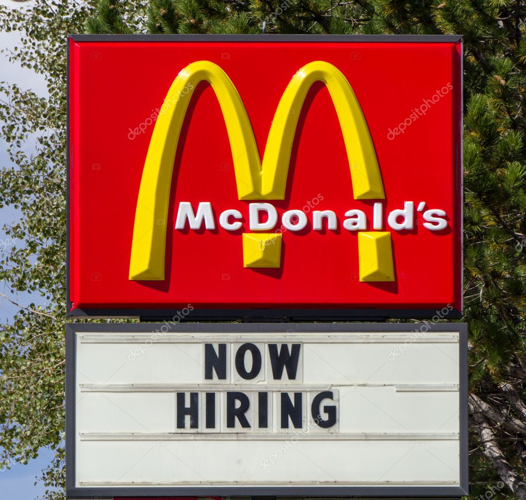 McDonald's Fast Foot Now Hiring Sign and Logo Stock Editorial Photo