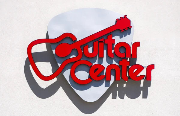 Gitar merkezi perakende satmak stok ve logosu — Stok fotoğraf