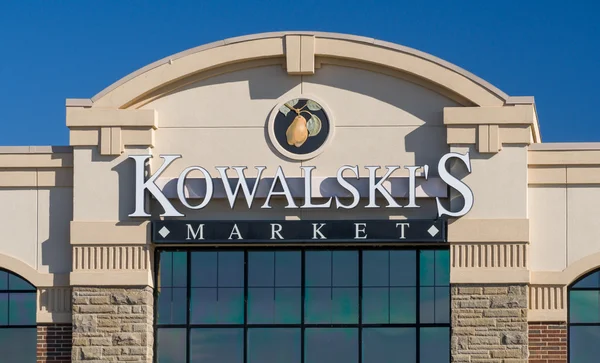 Kowalski de markt exterieur teken en Logo — Stockfoto
