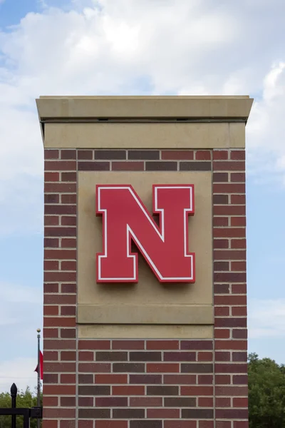 University of Nebraska Logo on Brick — Stock Photo, Image