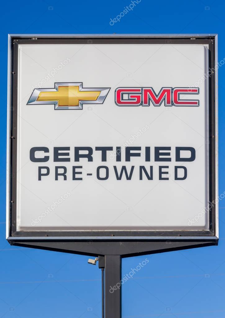 HUDSON, WI/USA - FEBRUARY 5, 2017: Chevrolet and GMC pre-owned automobile dealership sign.  Chevrolet and GMC are American automobile divisions of the American manufacturer General Motors.