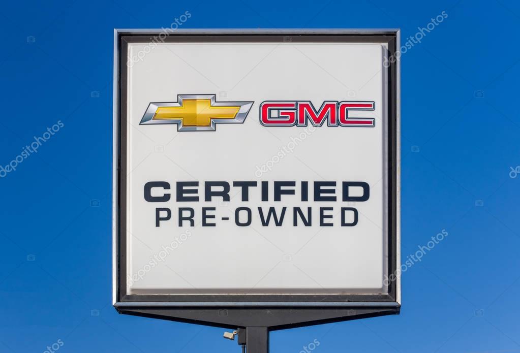 HUDSON, WI/USA - FEBRUARY 5, 2017: Chevrolet and GMC pre-owned automobile dealership sign.  Chevrolet and GMC are American automobile divisions of the American manufacturer General Motors.