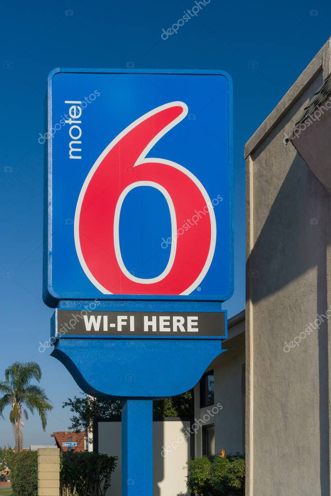 COSTA MESA, CA/USA - JANUARY 11, 2018: Motel 6 entrance sign and logo. Motel 6 is an American hospitality company with a chain of budget motels in the United States and Canada.