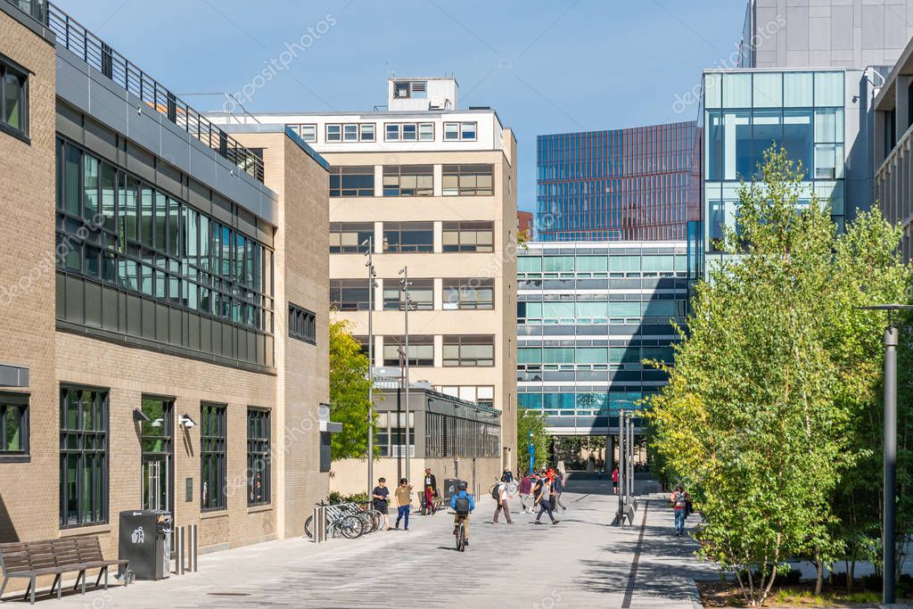 CAMBRIDGE, MA/USA - SEPTEMBER 29, 2019: Walkway and unidentified individuals on the campus of the Massachusetts Institute of Technology.