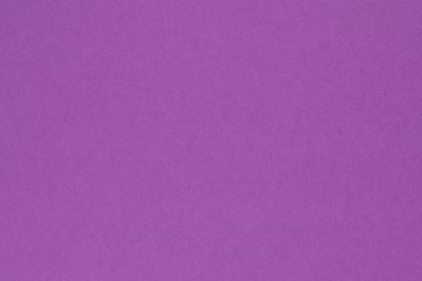 Mor renkli kağıt. Parlak doymuş arka plan ya da duvar kağıdı. Yüzey düzensizlikleri, lekeler ve gözenekler. Yukarıdan görüntüle