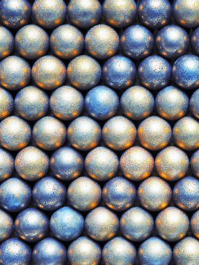 Açık sarı ve mavi renkli bir çok topun yüzeyi. Soyut parlak şenlik arkaplanı veya duvar kağıdı. Yukarıdan bak. Dikey çekim. Makro