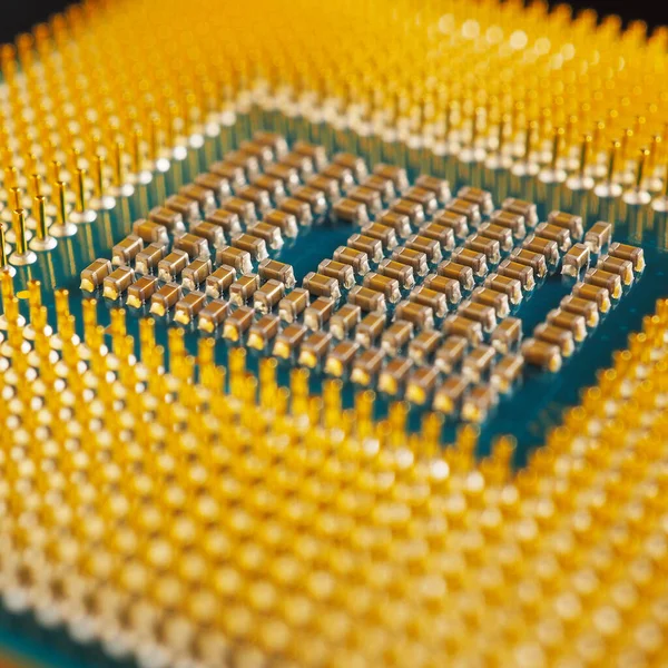 Processor microprocessor CPU computer or laptop very close-up. Semiconductors, pins and connectors. IT. Illustration: electronic and computing equipment. Macro