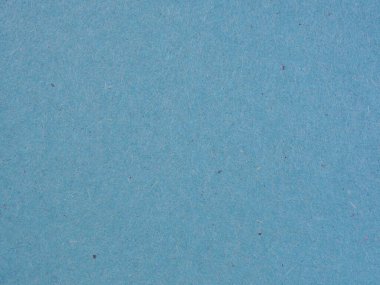 Mavi ya da gök mavisi gri bir karton yaprağın yüzeyi. Selüloz lifli pürüzlü doğal kağıt dokusu. Arkaplan ya da duvar kağıdı. Yukarıdan bak. Makro