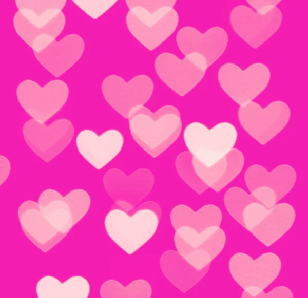 Heart bokeh background, photo blurry objects, pink and red — Stock Photo, Image