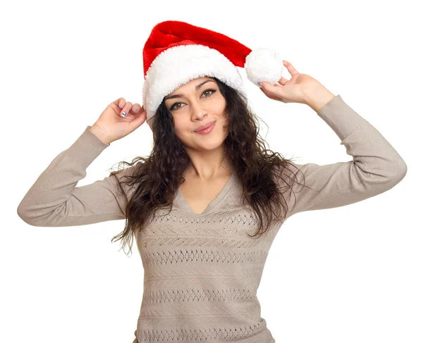 在白色背景，圣诞假日概念上圣诞老人的帽子画像中的女孩 — 图库照片