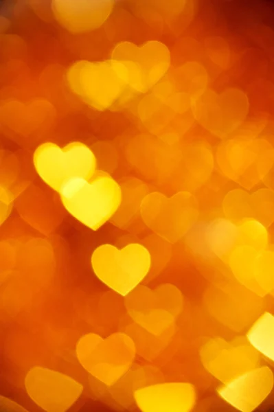 Golden heart bokeh background photo, abstract holiday backdrop — Stock Photo, Image