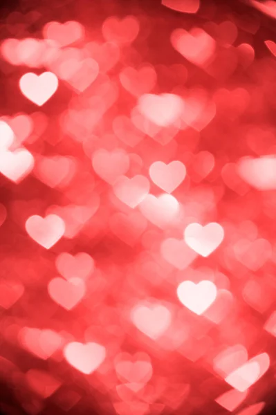 Light red heart bokeh background photo, abstract holiday backdrop — Stock Photo, Image