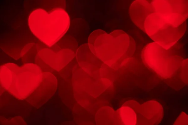 Rotes Herz Bokeh Hintergrund Foto, abstrakte Feiertagskulisse — Stockfoto